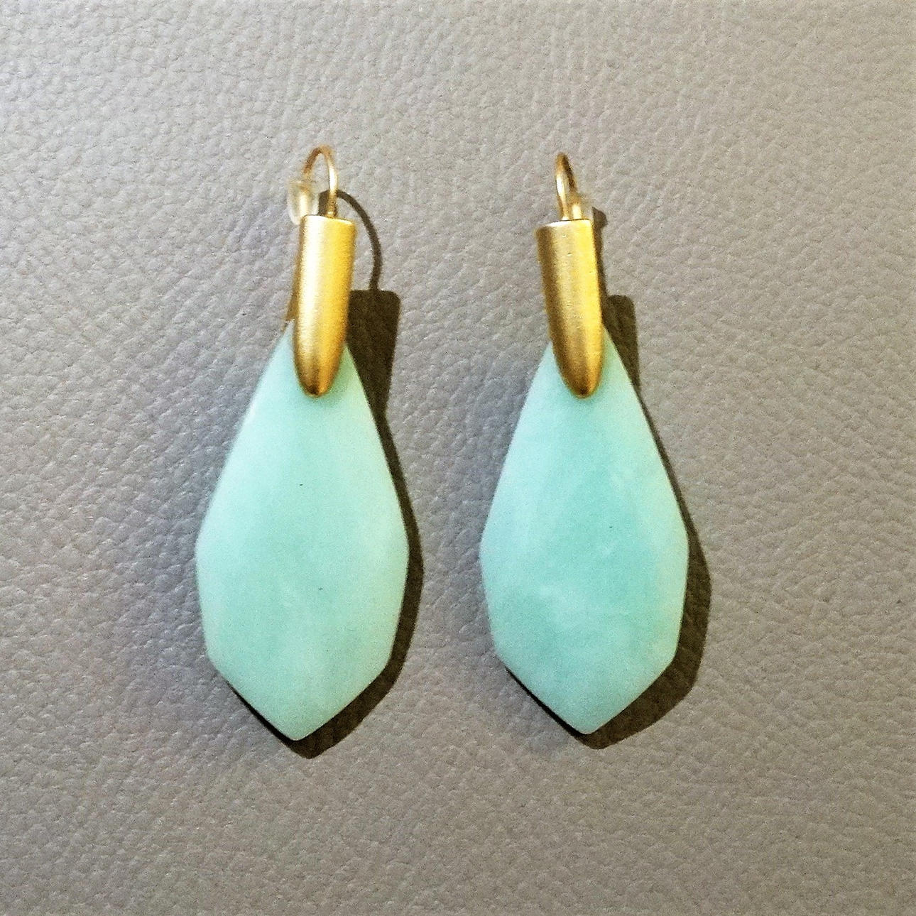 EARRINGS with light blue GEM.