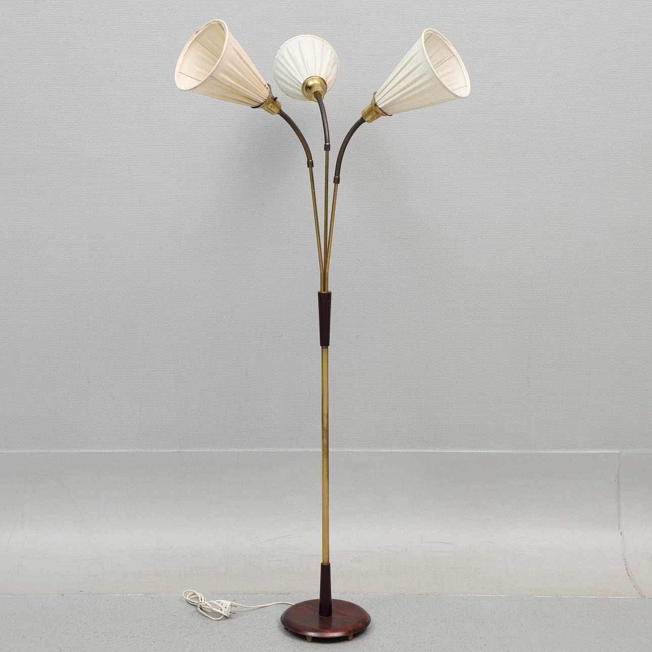 FLOOR LAMP, three-armed, brass, 1950s/60s.