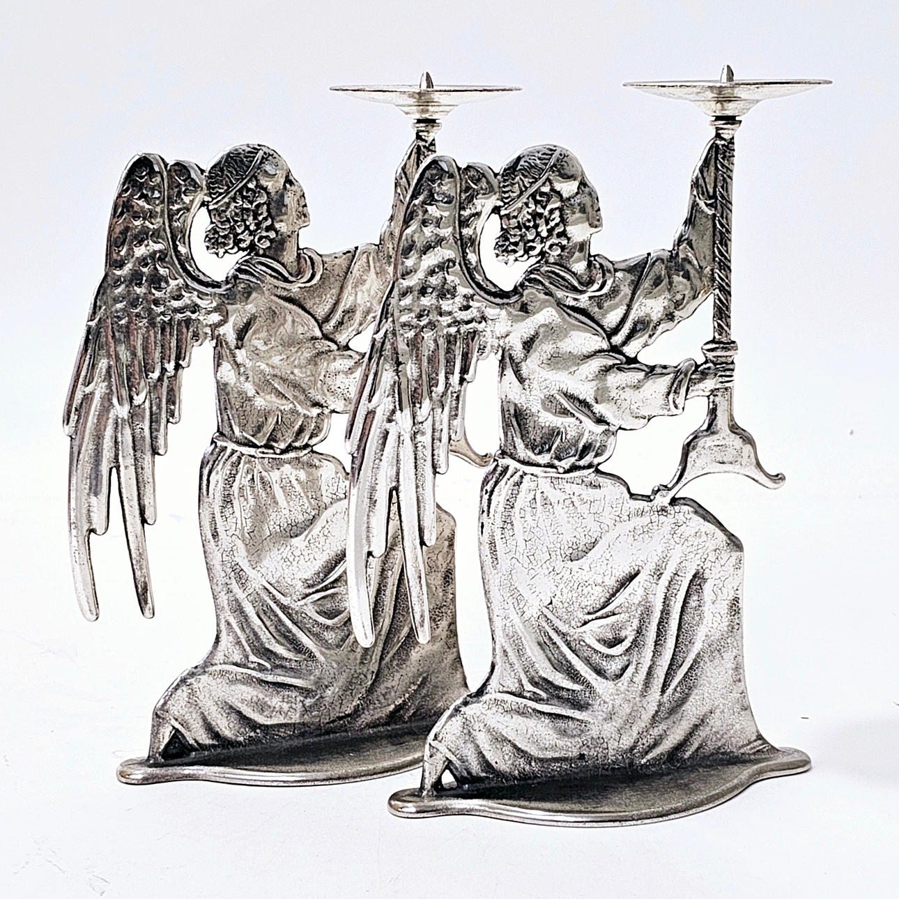 PAIR OF SILVER METAL CANDLE HOLDERS LIKE ANGELS. Silver & Metals ...