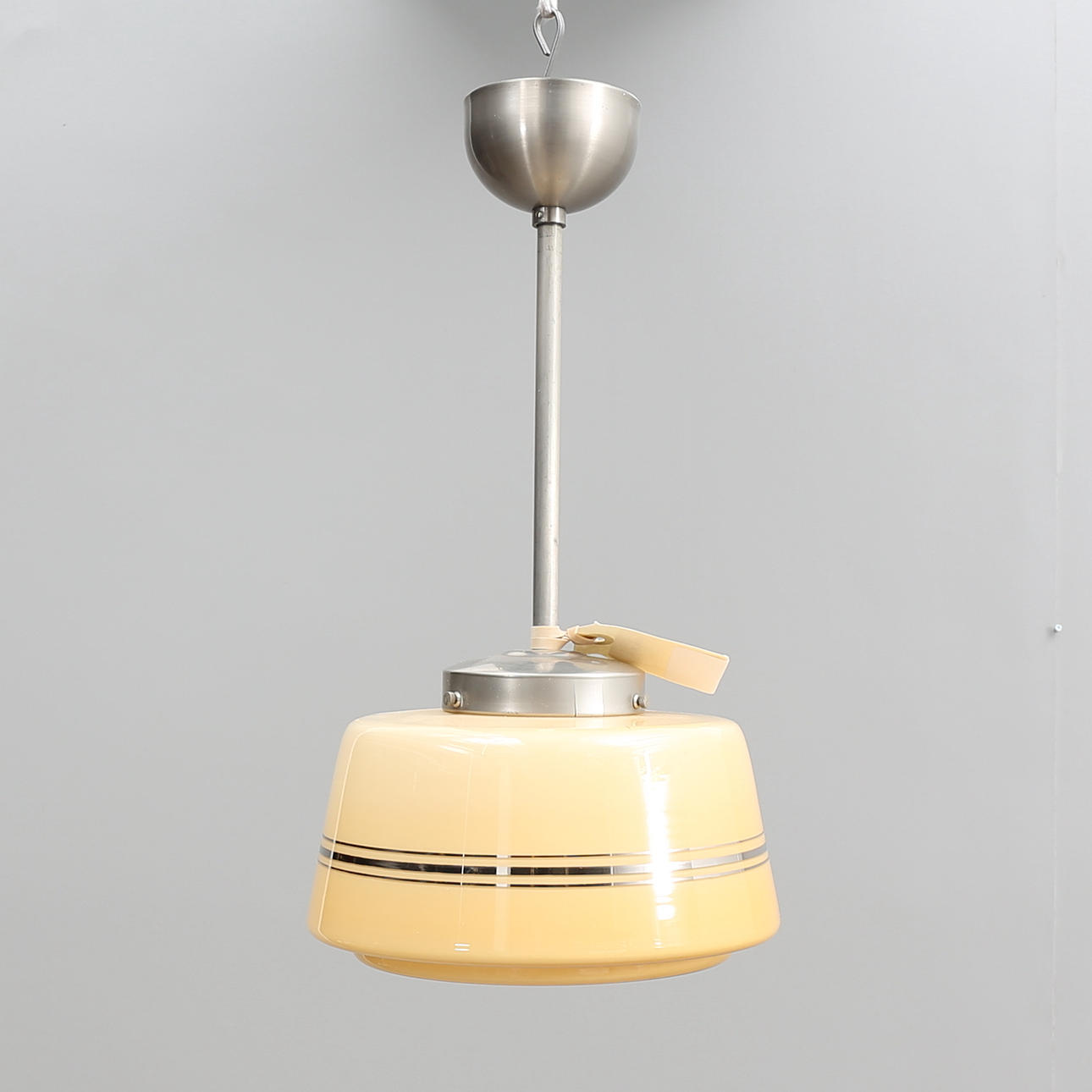 TAKLAMPA, 1900-talets första hälft.