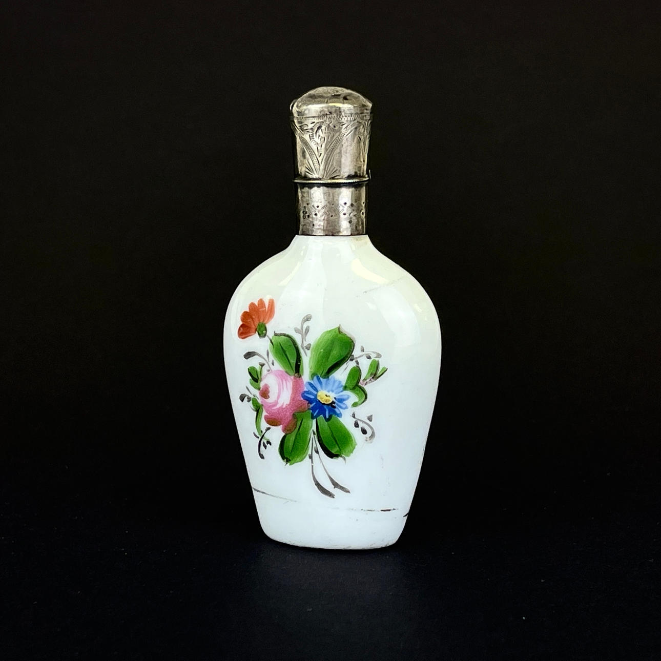 SILVER-MOUNTED PERFUME BOTTLE.