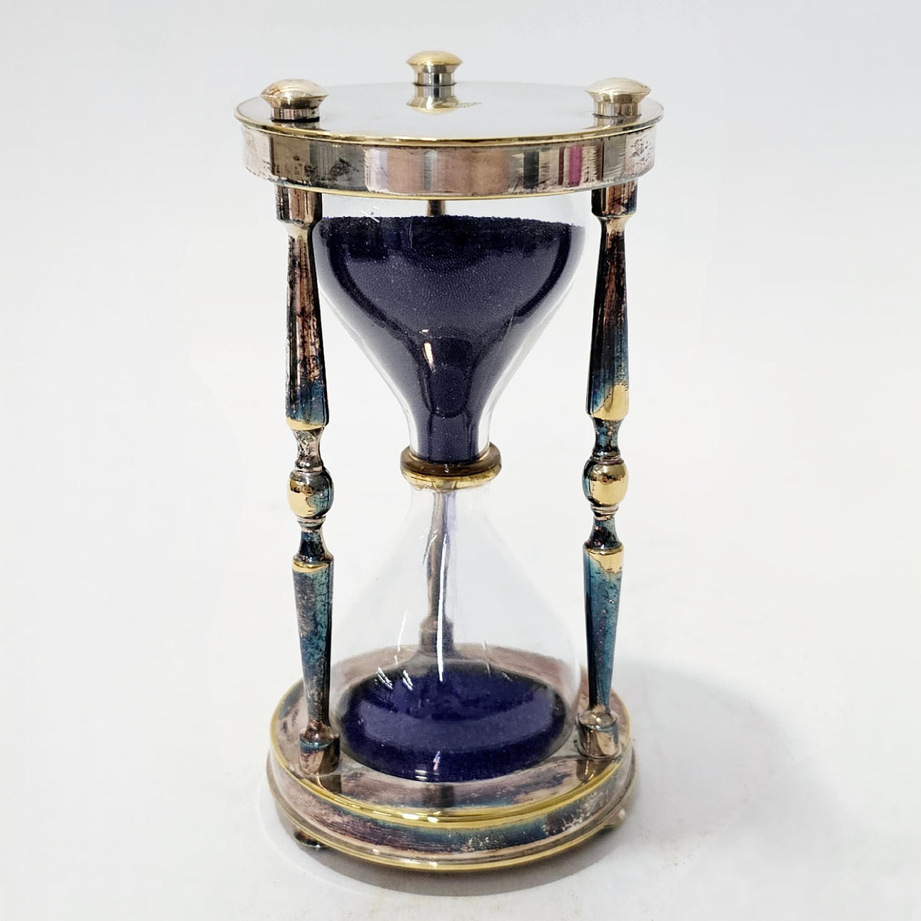 KRISTOFLES. BLÅ TIMGLAS I SILVER ALPACKA.