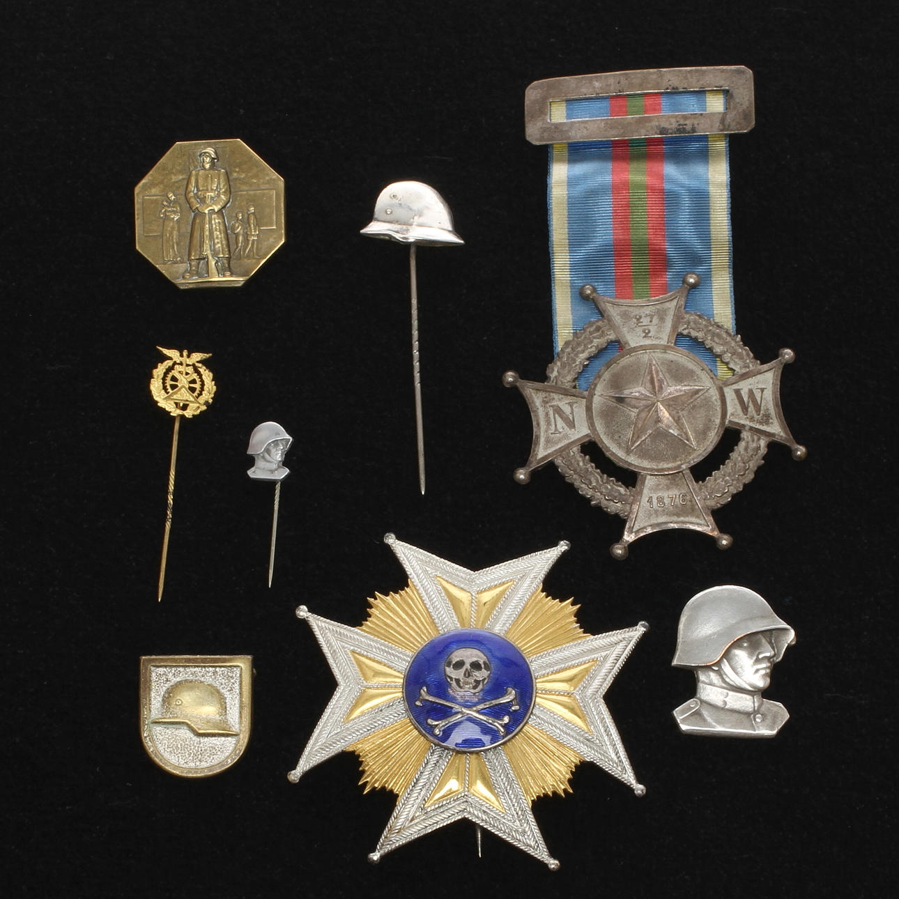 MÄRKEN och MEDALJER bland annat Schweiz. 8 stycken.