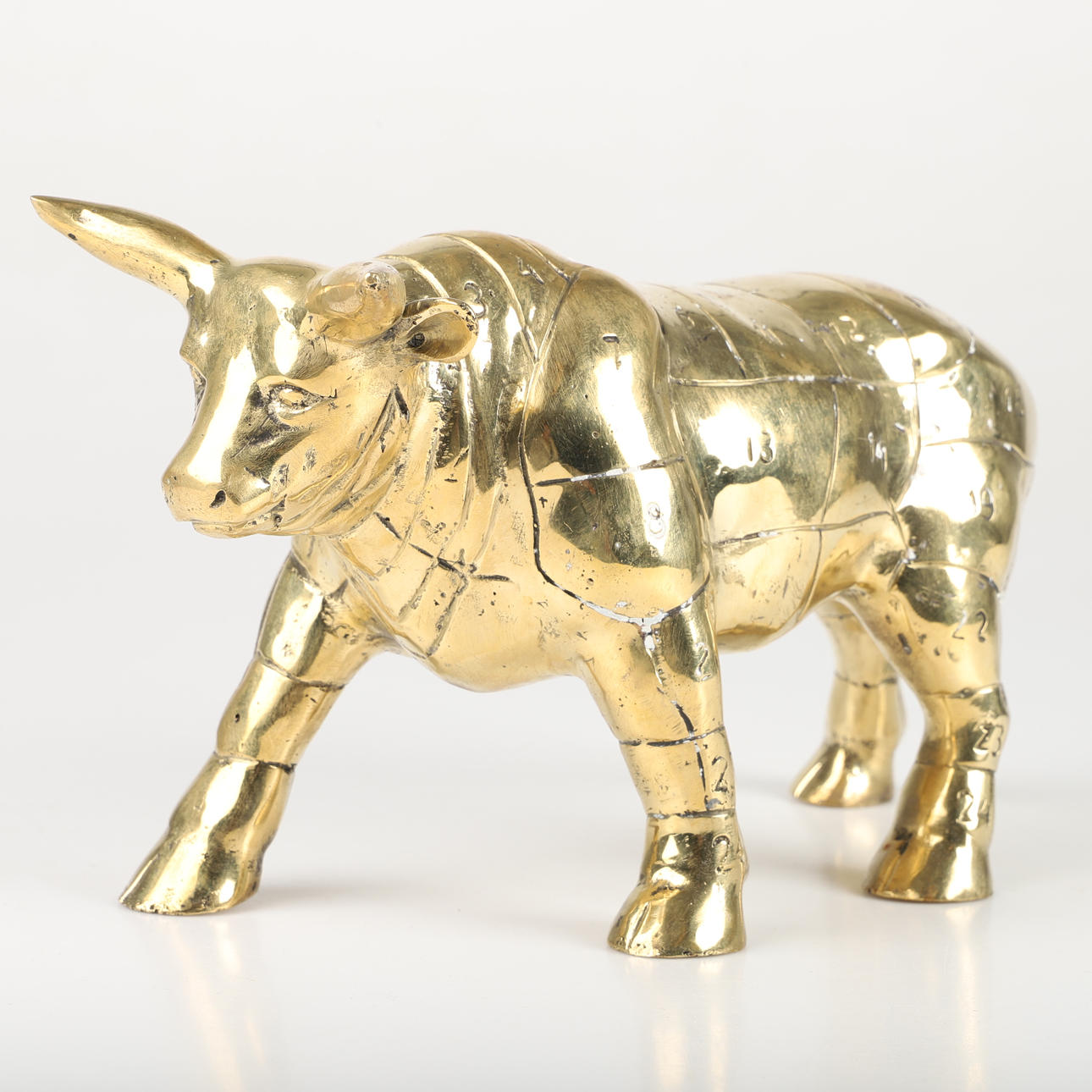 SCULPTURE, cattle with dissection diagram, gilt bronze.