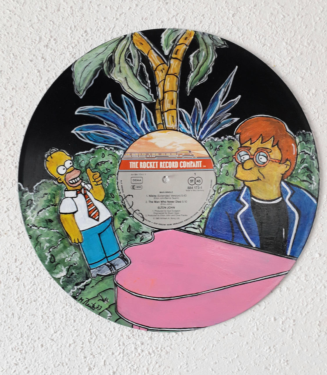 MANUELA REITZ. 'Homer Simpson and Elton', 2023, mixed media on LP, signed.