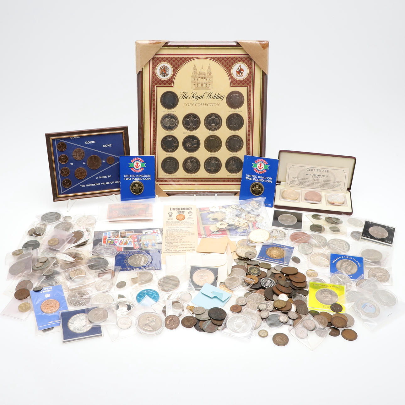 A LARGE COLLECTION OF WORLD COINAGE AND OTHER RELATED ITEMS. Coins ...
