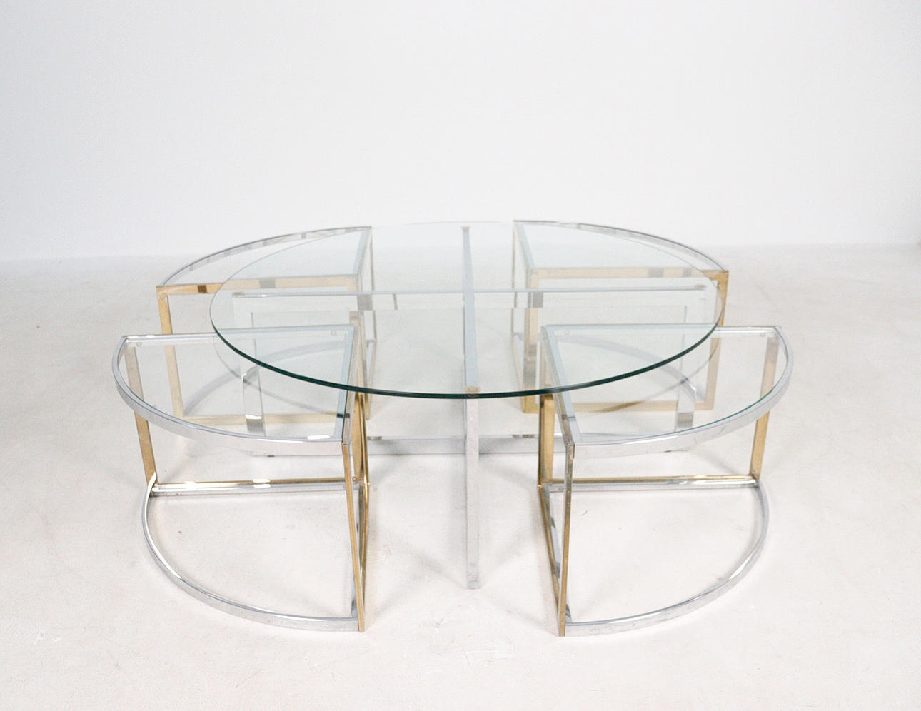 Maison Charles, 1970s round table with four side tables.