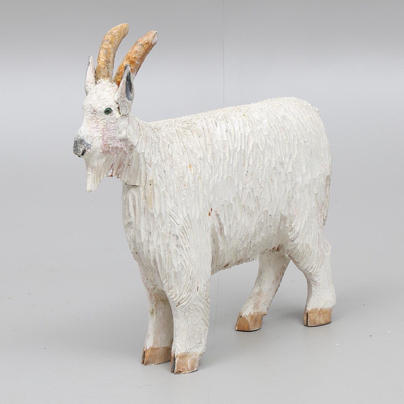 RAGNAR ALMROT. Skulptur, skuret trä, get, signerad R A.