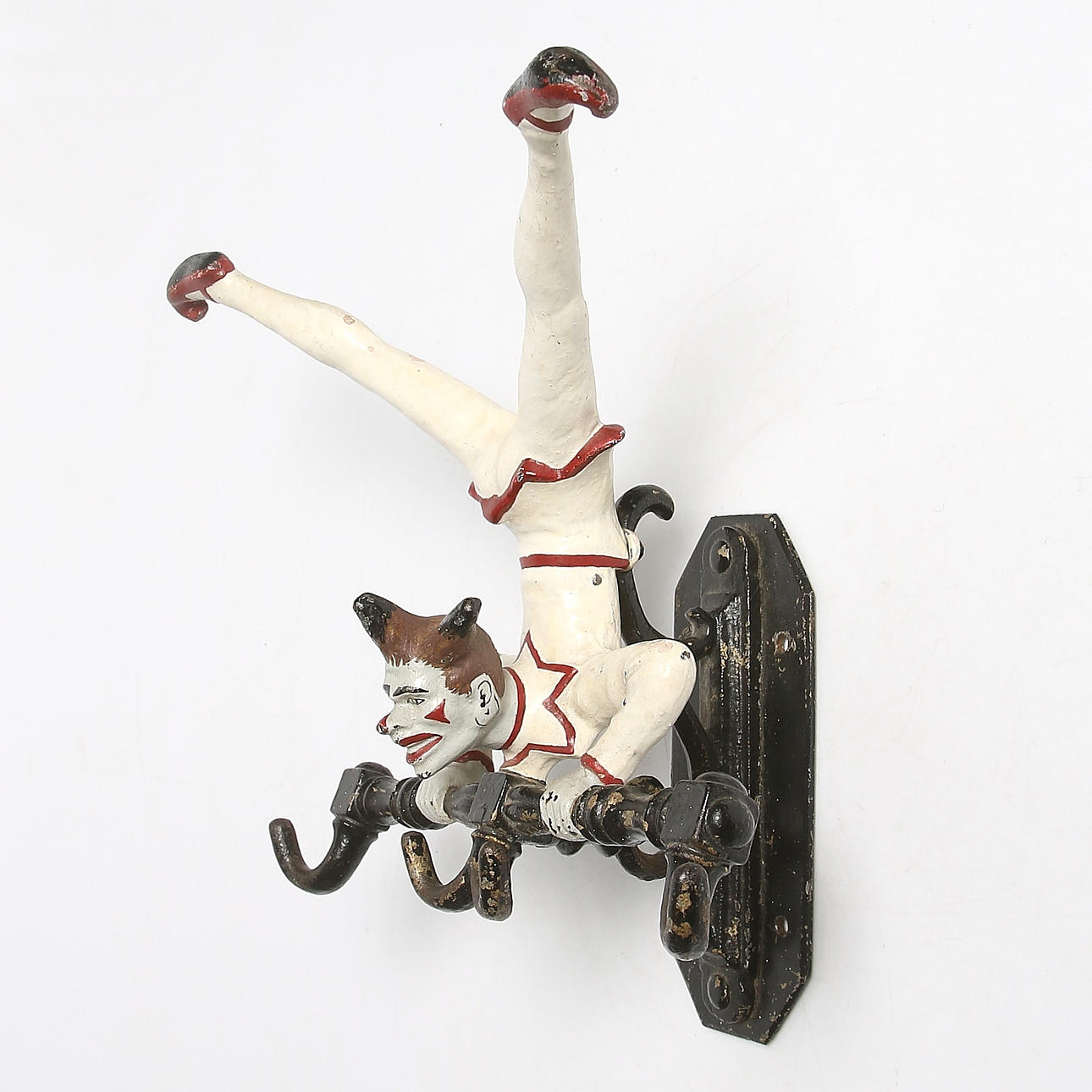 KLÄDHÄNGARE, gjutjärn, "Gycklaren", Hults bruk. Sekelskiftet 18/1900-talet.