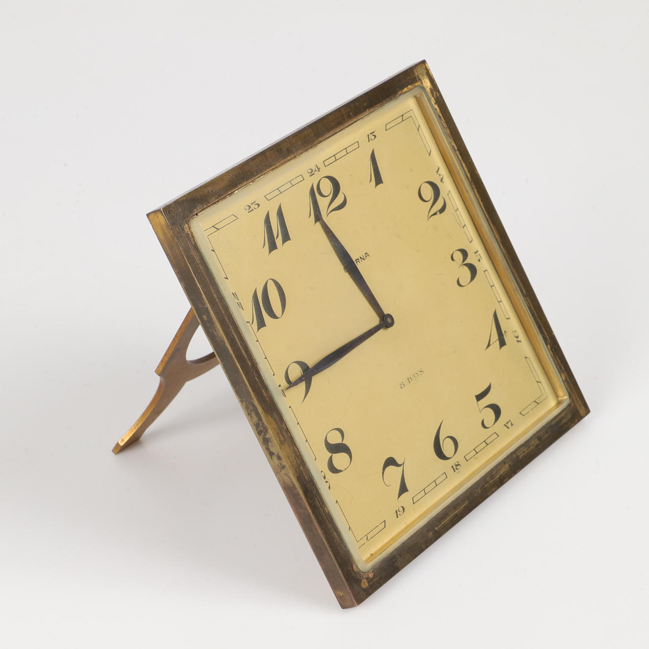 TABLE CLOCK, "8 days", brass with glass, Eterna, 1920s.