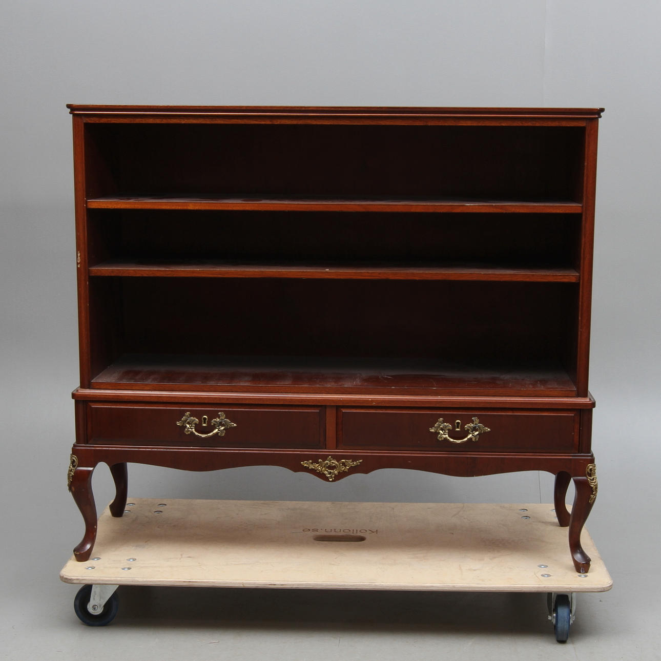 BOKHYLLA med lådor, mahognyfanér, 1900-tal.