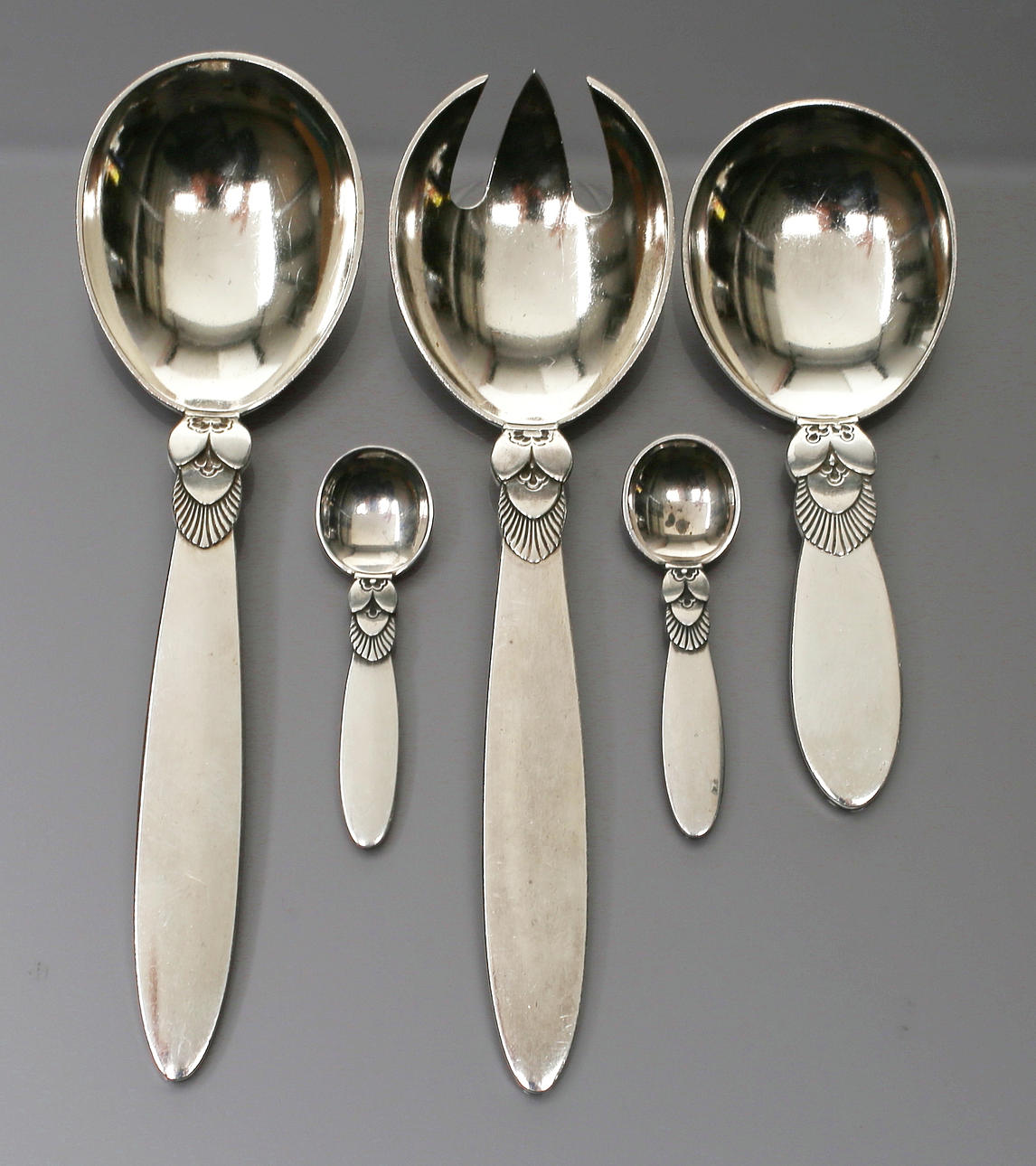 GUNDORPH ALBERTUS (1887 HILLEROD 1969). 5 Diverse Sterling Silver kaktus skedar.