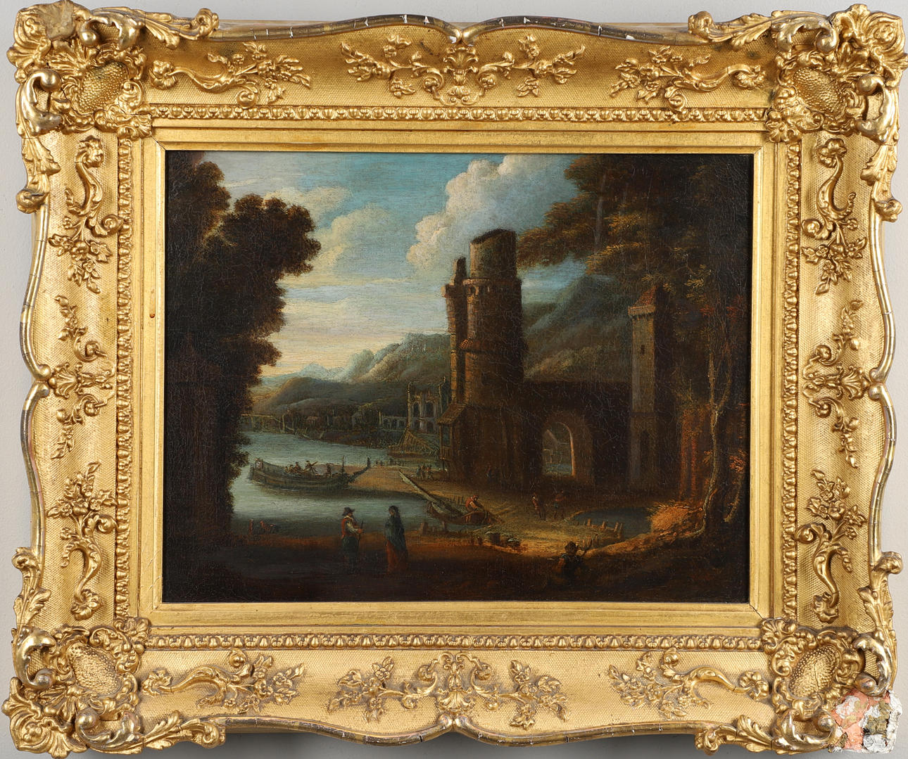 CIRCLE OF ADRIAEN FRANS BOUDEWIJNS (1644-1711). FIGURES AND BOATS NEAR RUINED BUILDINGS ON A MOUNTAINOUS COAST.