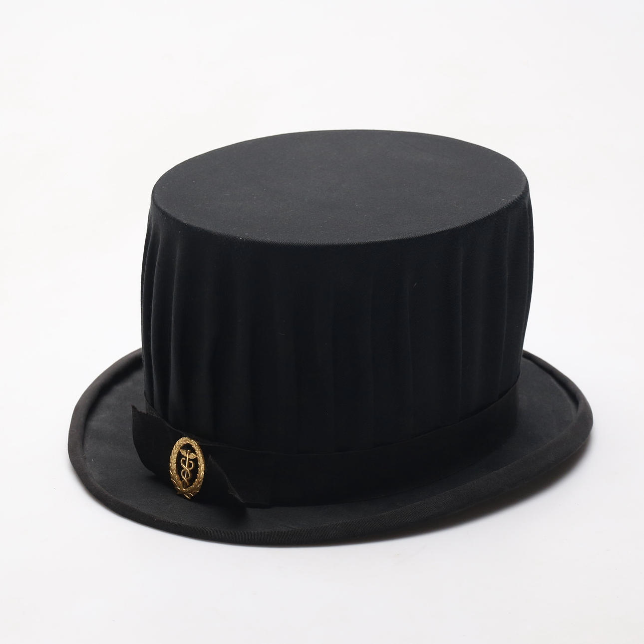 DOKTORSHATT, ekonomi, Hattmakare Mark Eriksson.