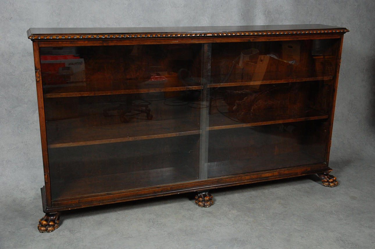 BOKSKÅP, med skjutbara glasdörrar, 1920-tal.