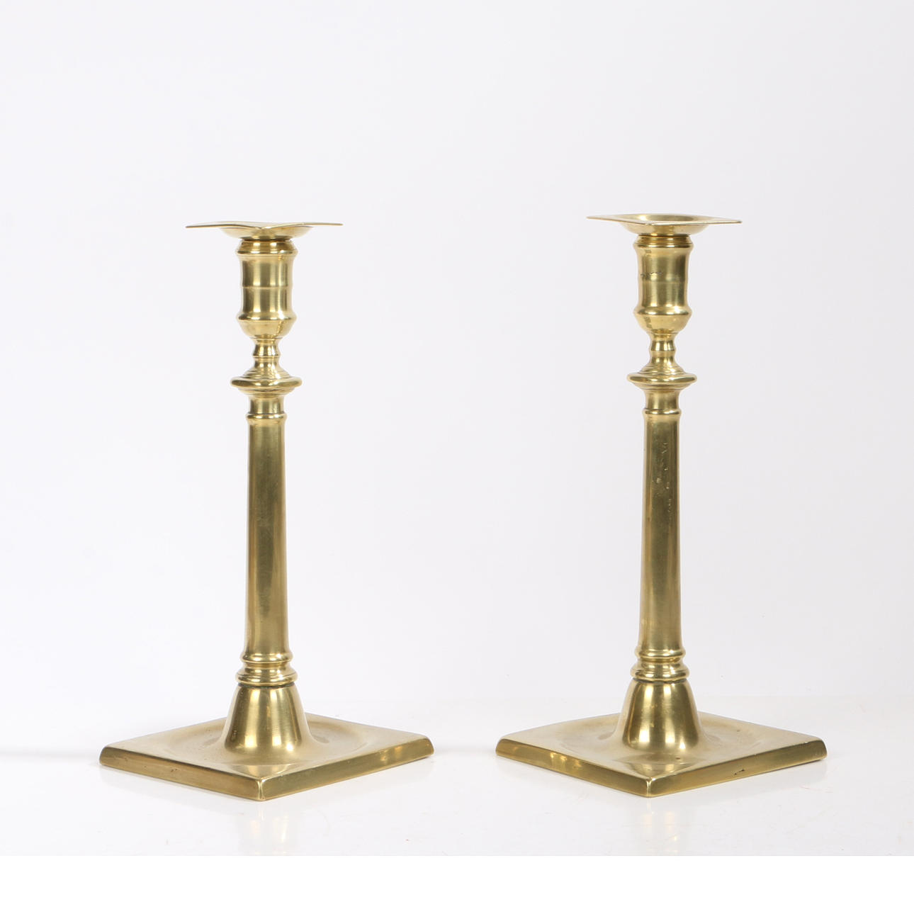 A PAIR 18TH CENTURY BRASS CANDLESTICK.
