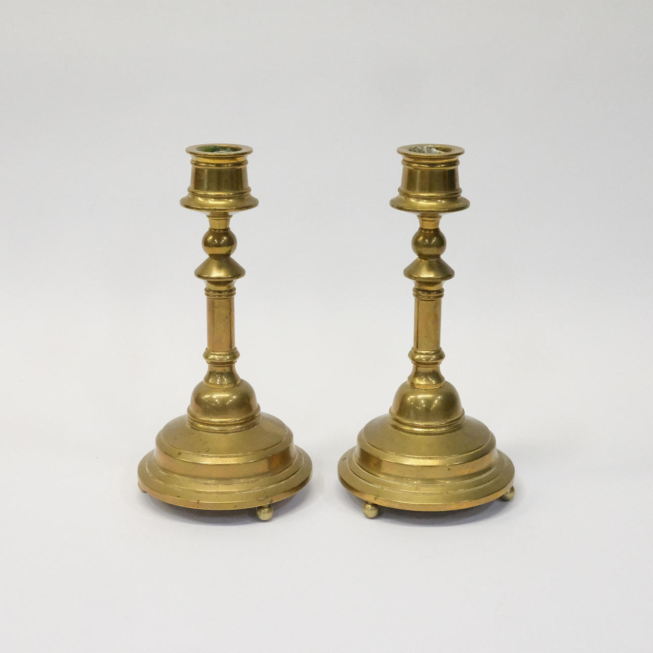 GUSUM'S USE. CANDLESTICKS, A PAIR:.