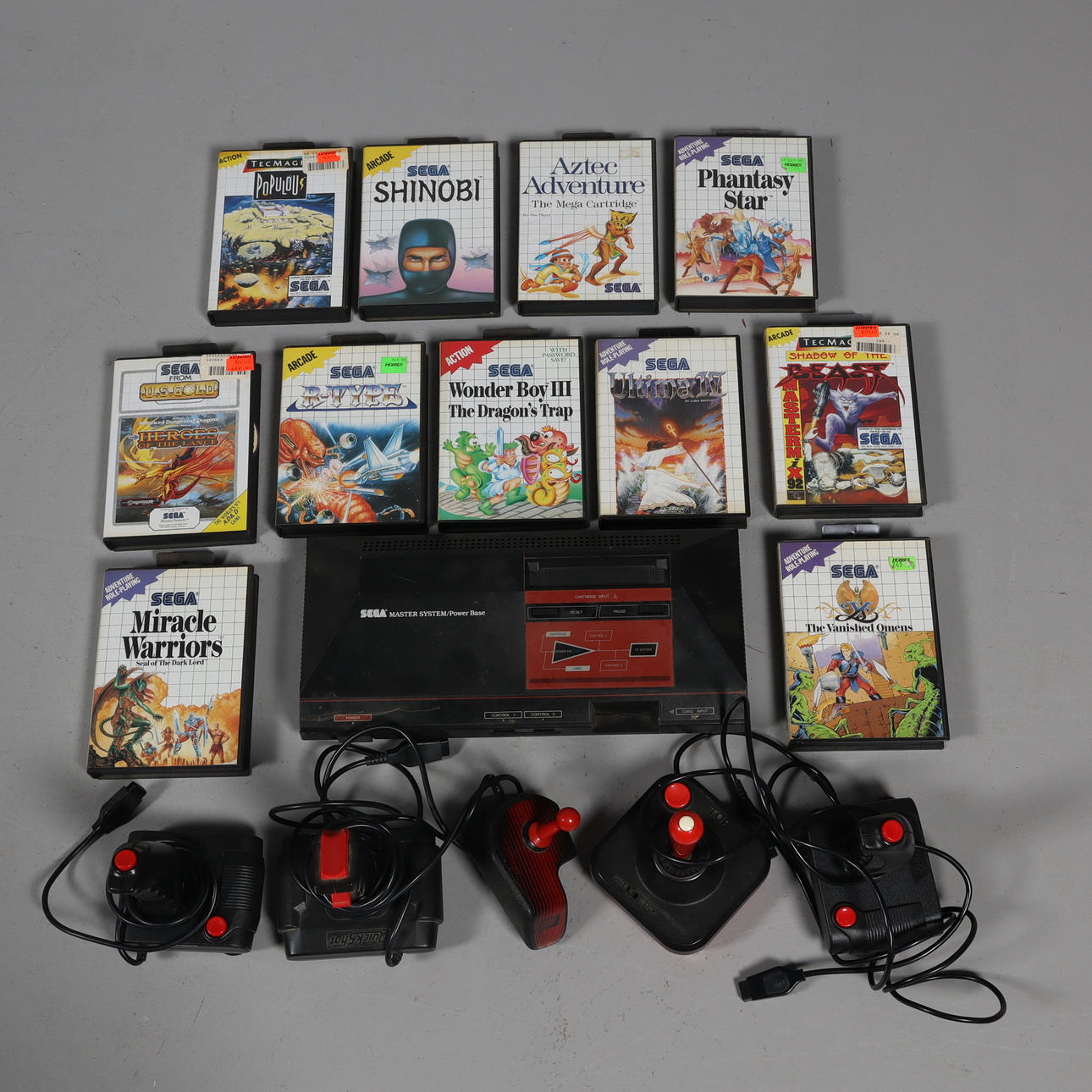 GAME CONSOLE, "Sega master system", joysticks and 11 games.
