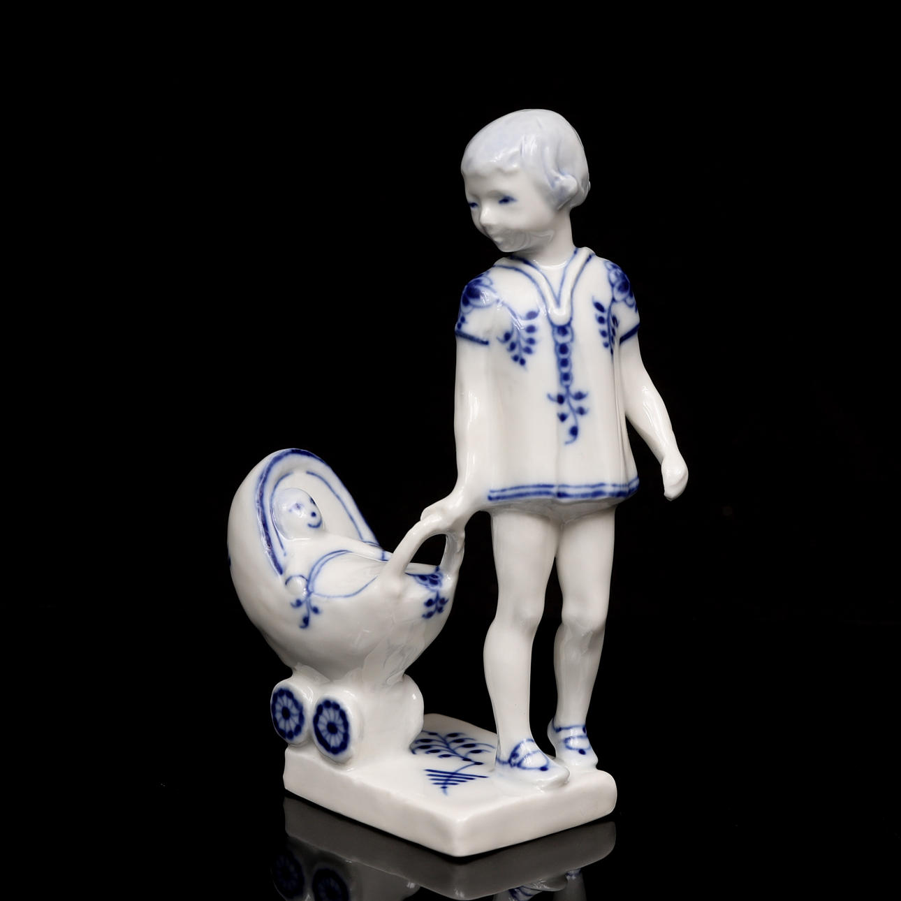HANNE VARMING. Figurine, girl with doll carriage, 