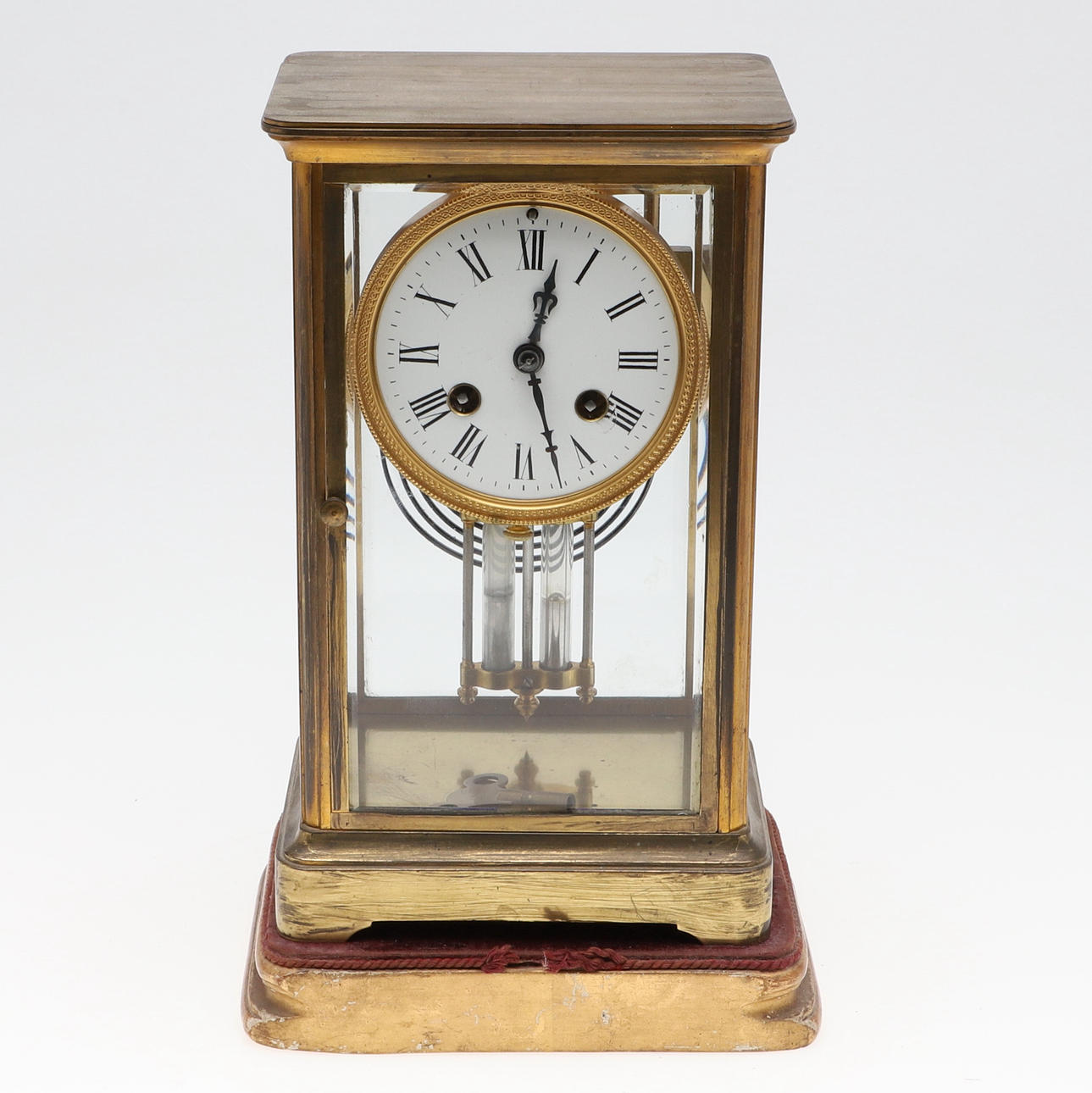 A BRASS MERCURY PENDULUM MANTEL CLOCK.