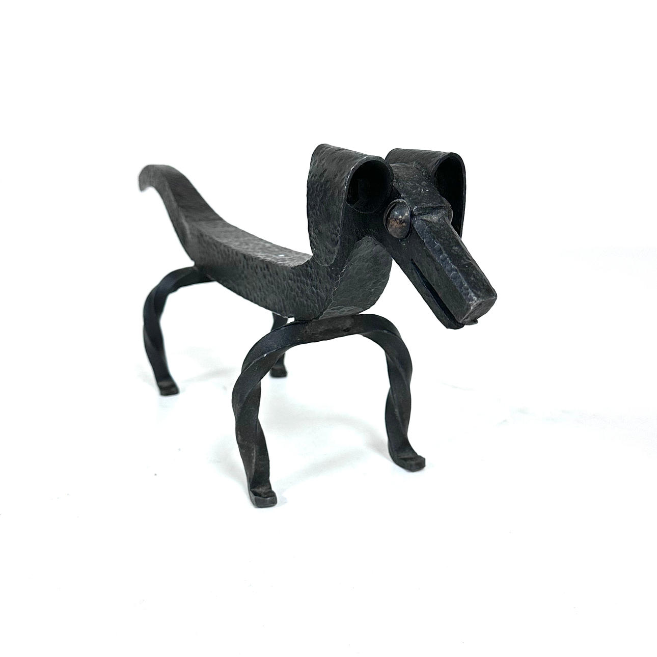 ELDHUND, smide, 1900-tal.