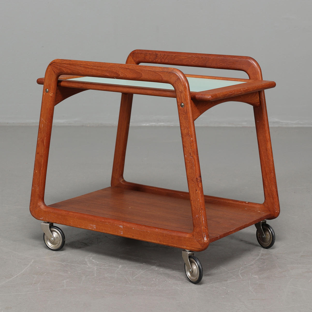 SERVING WAGON, teak and laminate, mid-20th century.