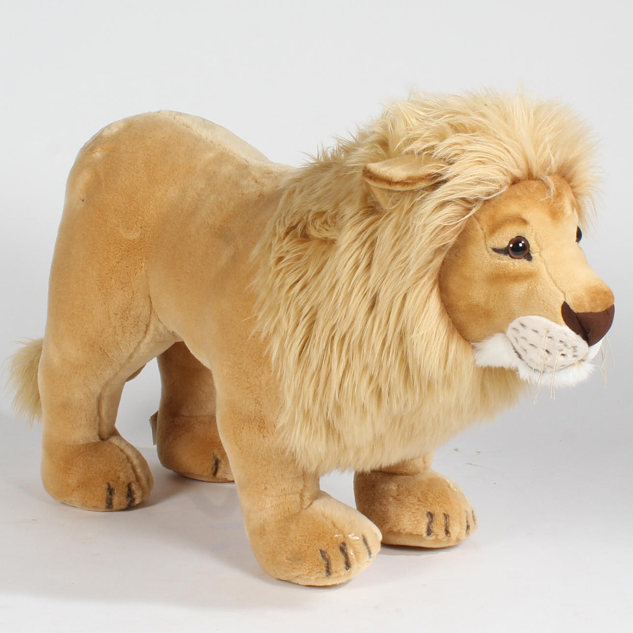 LARGE STEIFF LION WITH BUTTON AND LABEL.