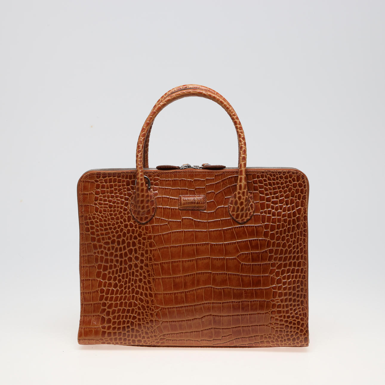 OSPREY, taske i præget læder.