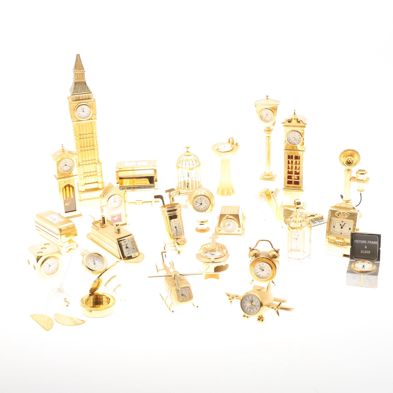 25 NOVELTY MINIATURE CLOCKS.