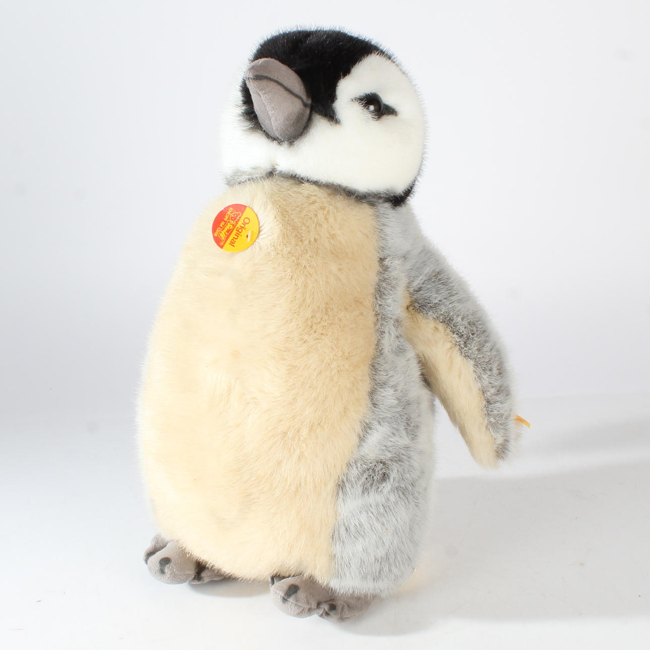 STEIFF BABY PENGUIN WITH BUTTON AND LABEL.