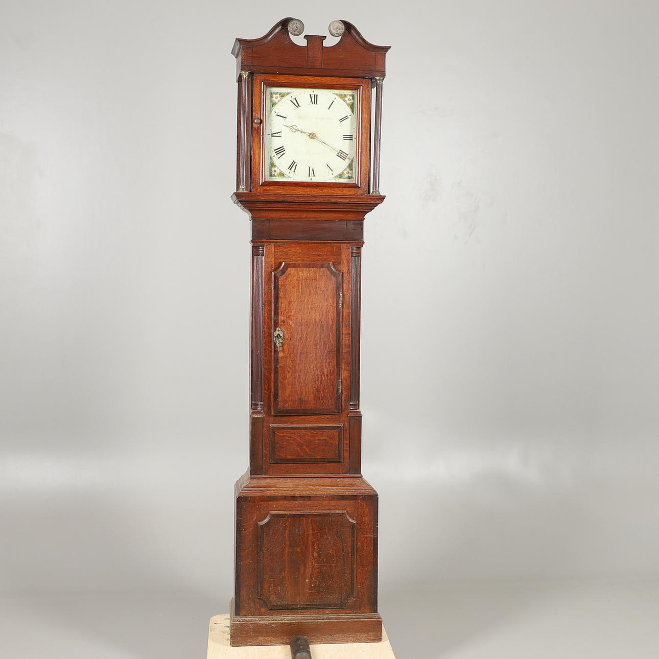 A 30 HOUR OAK LONGCASE CLOCK.