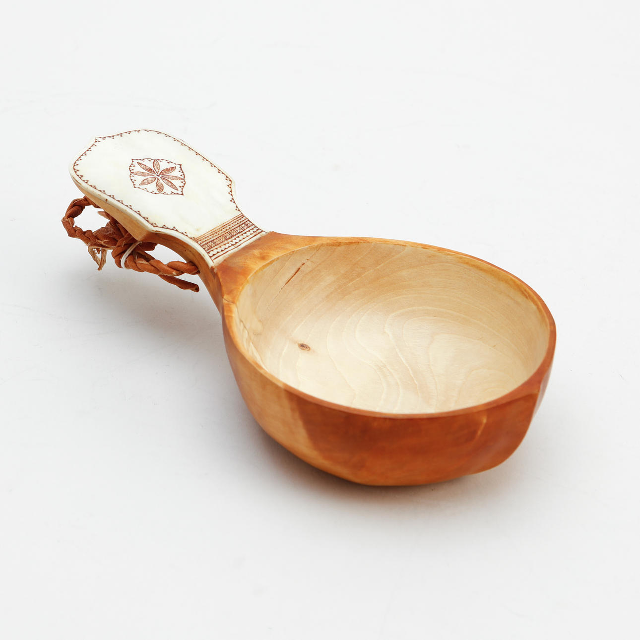 LARS JUUSO. Cheese, birch and reindeer antler, signed.
