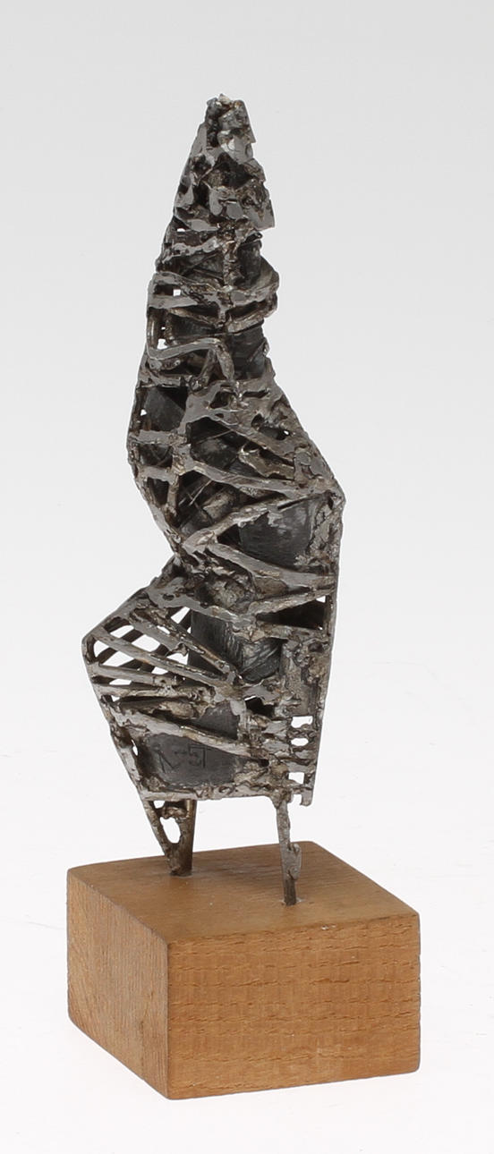 ÅKE LAGERBERG. "Etrusker", metall, signerad och daterad -57.