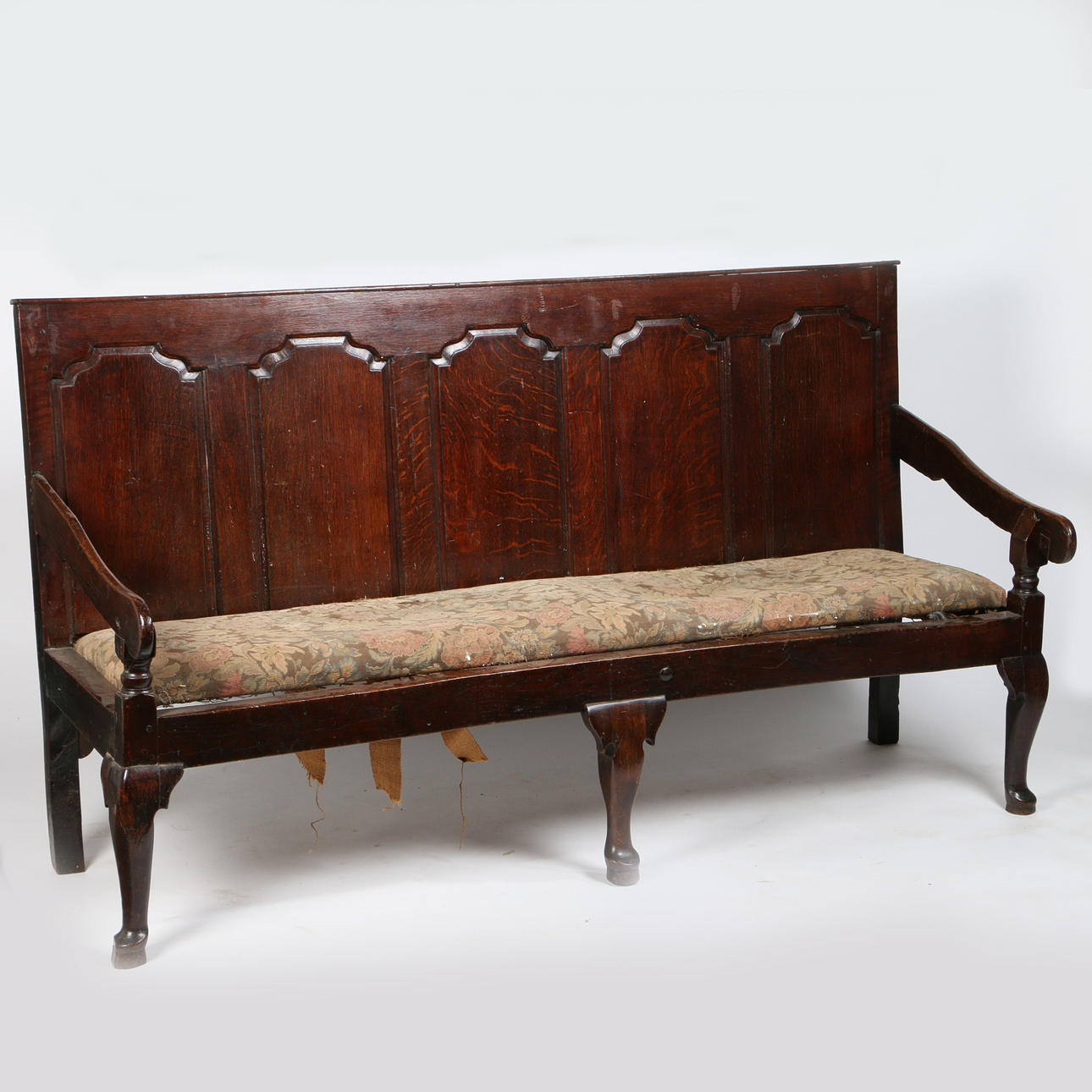 A GEORGE III OAK SETTLE.