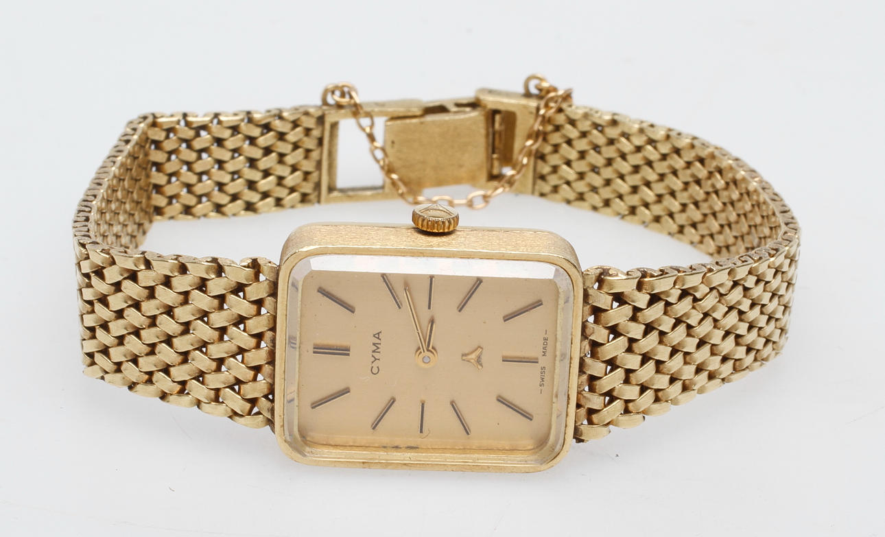 DAMUR CYMA MED ARMBAND, 18k guld, total vikt ca 48,2 gr.