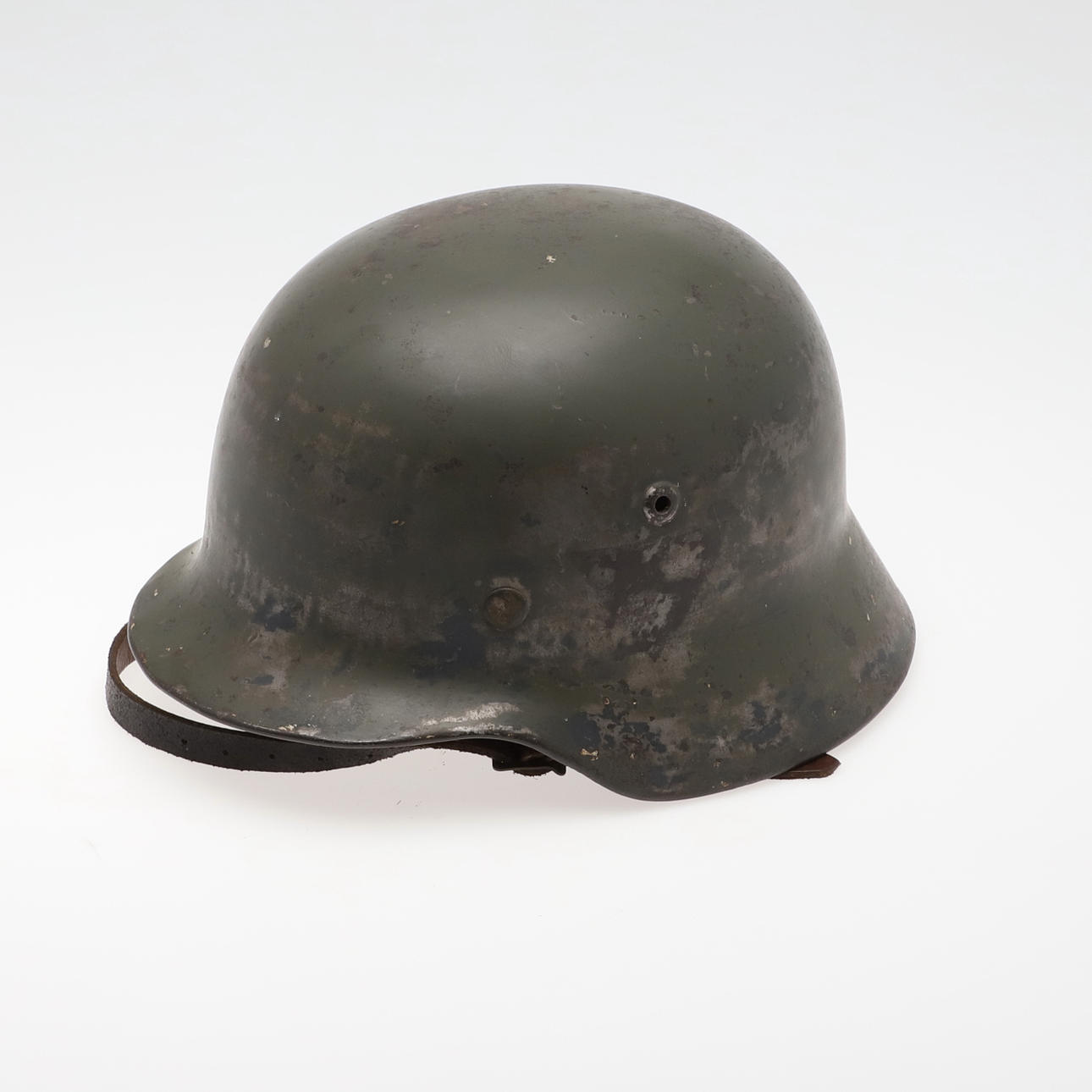 A BLACK M40 TYPE HELMET AND LINER.
