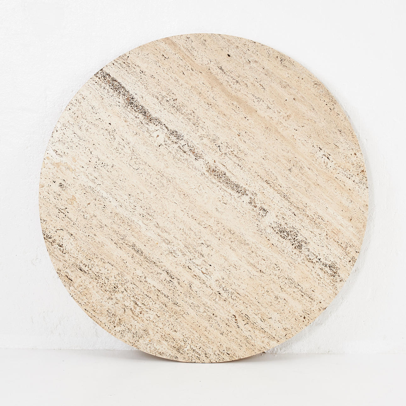 STENSKIVA, travertin, rund form.