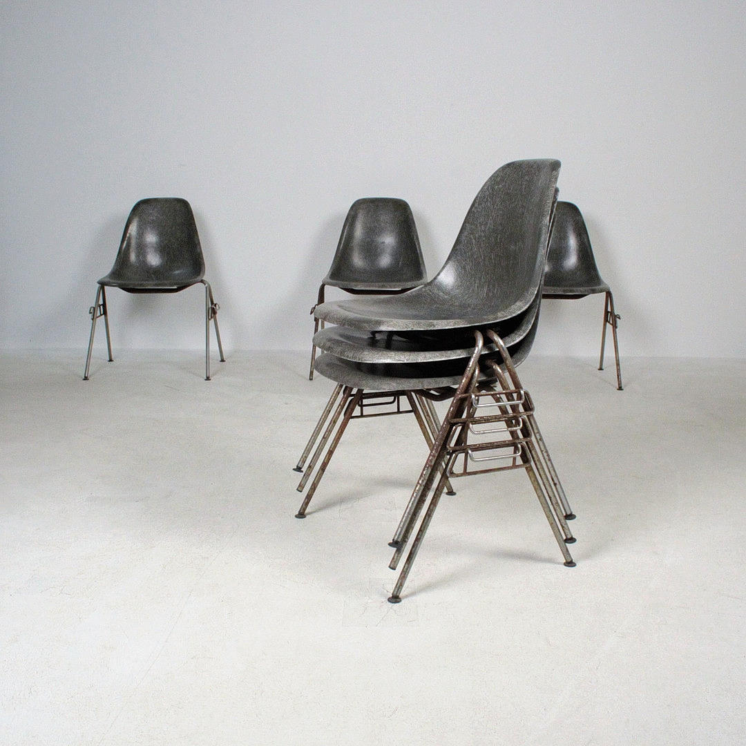 CHARLES EAMES. for Herman Miller, six shell chairs on a row frame, model “DSS”.