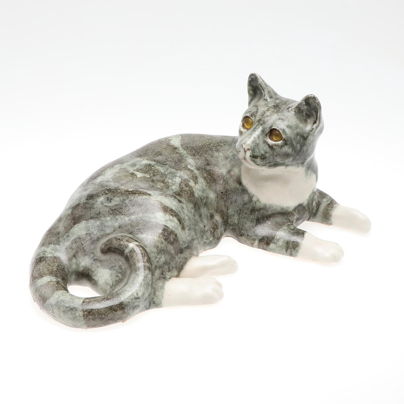 A LARGE WINSTANLEY POTTERY STRIPED GREY/GREEN CAT.