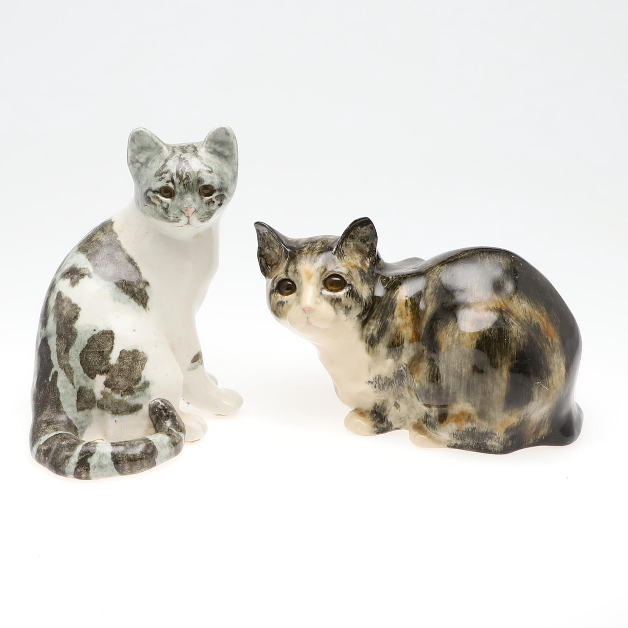 TWO WINSTANLEY POTTERY CATS.