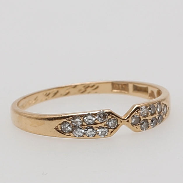 RING i 18K gulguld besatt med 16 diamanter, Stigbert, Heribert Engelbert AB, Stockholm, 1981.