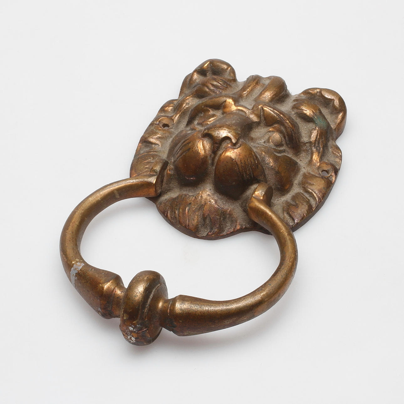 DÖRRKLÄPP, lejonmaskaron, 1900-tal.