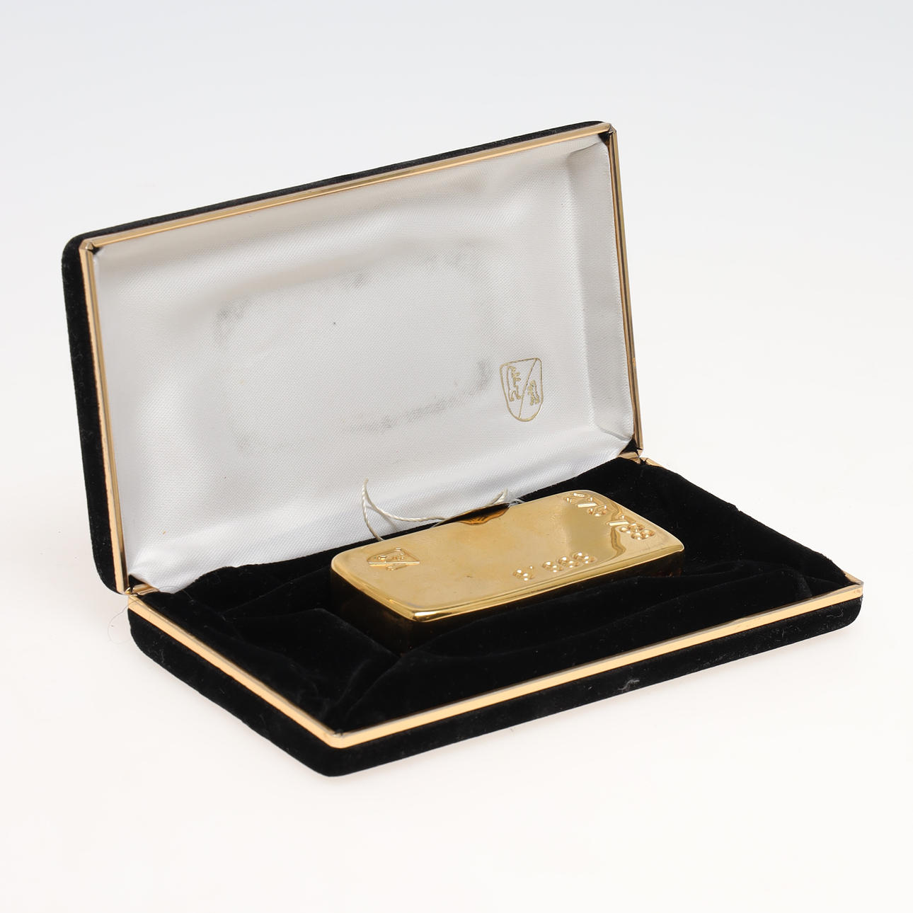 LIGHTER, in the form of a gold bar.