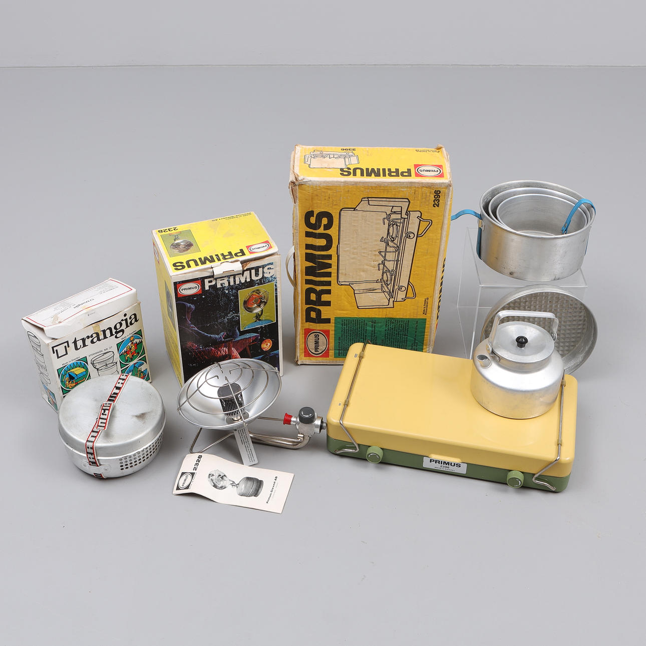 Camping kitchen with accessories, including Primus-Sievert AB.