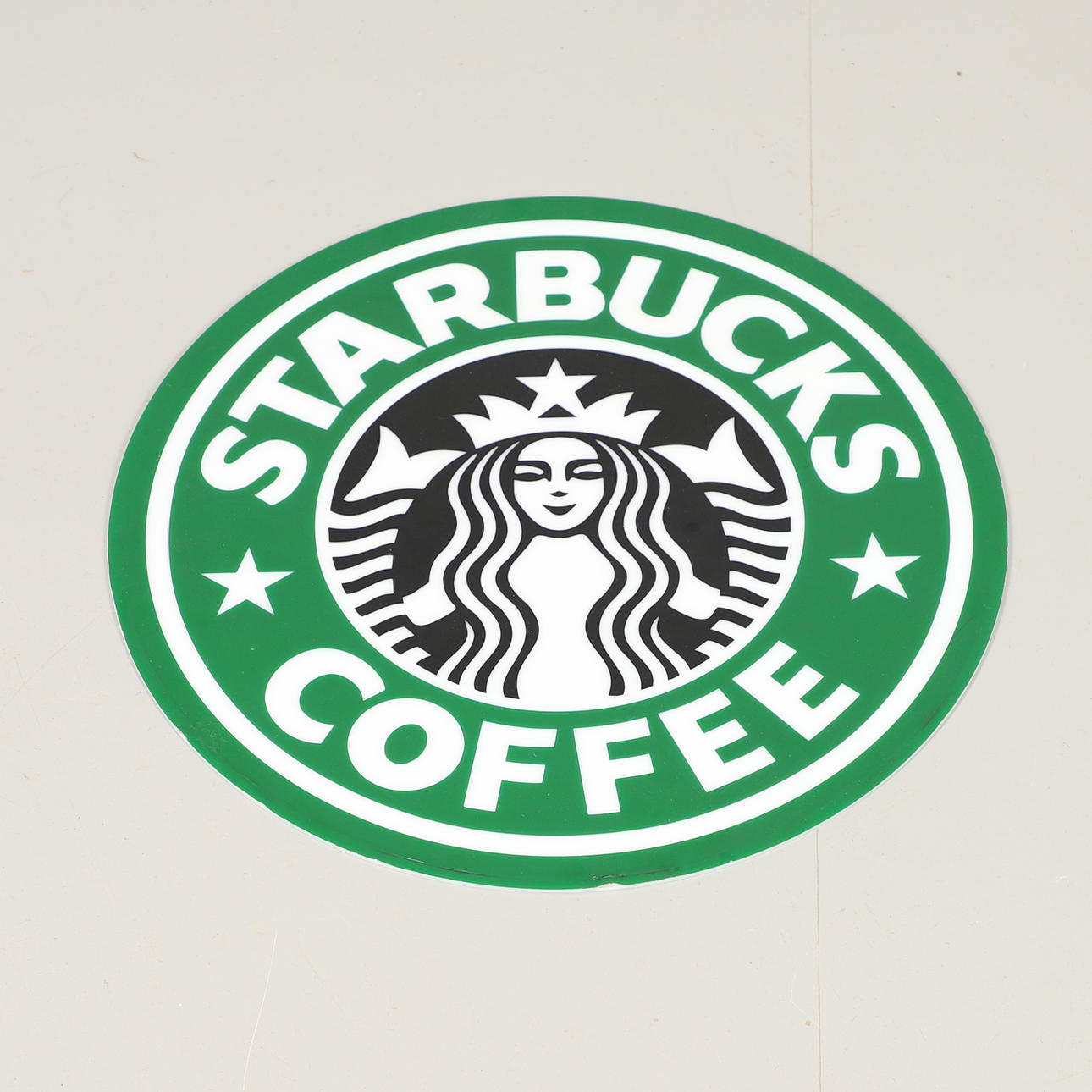 UN CARTEL DE PERSPEX DE STARBUCKS COFFEE.