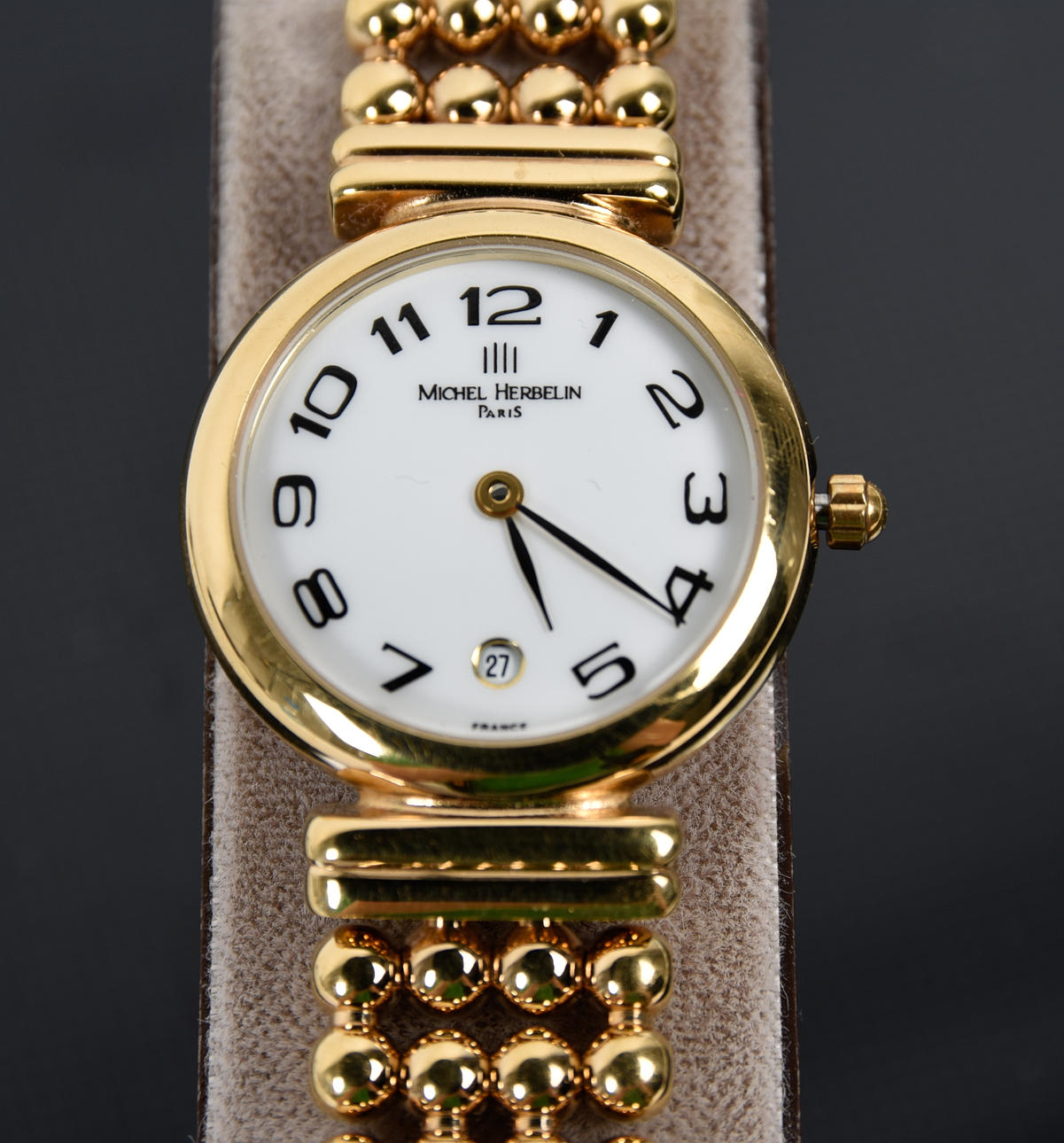 MICHELLE HERBELIN, PARIS. Duble/guldpläterad damklocka.