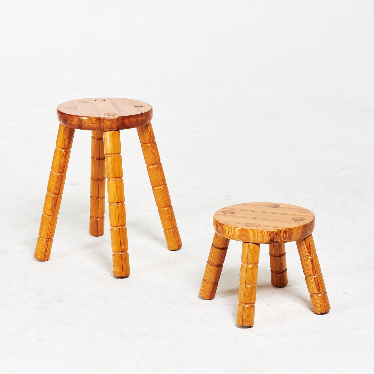 STOOLS, a pair, 1970s, pine, signed Jonas Edler 1976 on the bottom.