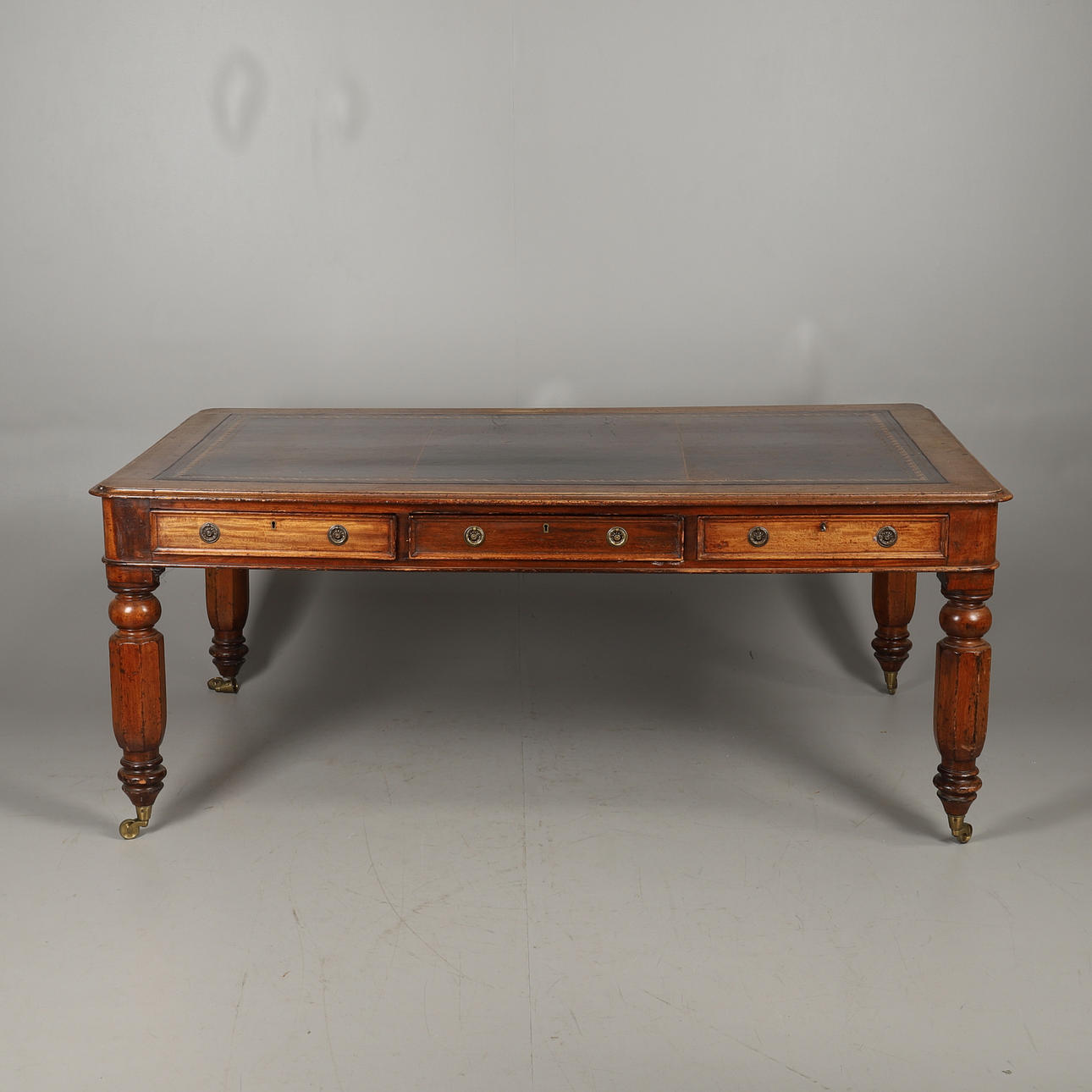 A VICTORIAN MAHOGANY LIBRARY TABLE.