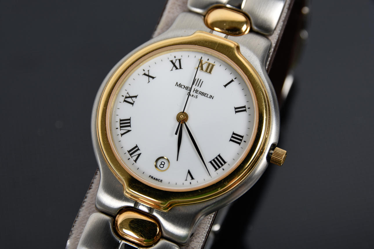 MICHELLE HERBELIN PARIS. Herrklocka stål dublee, safirglas, länkband.