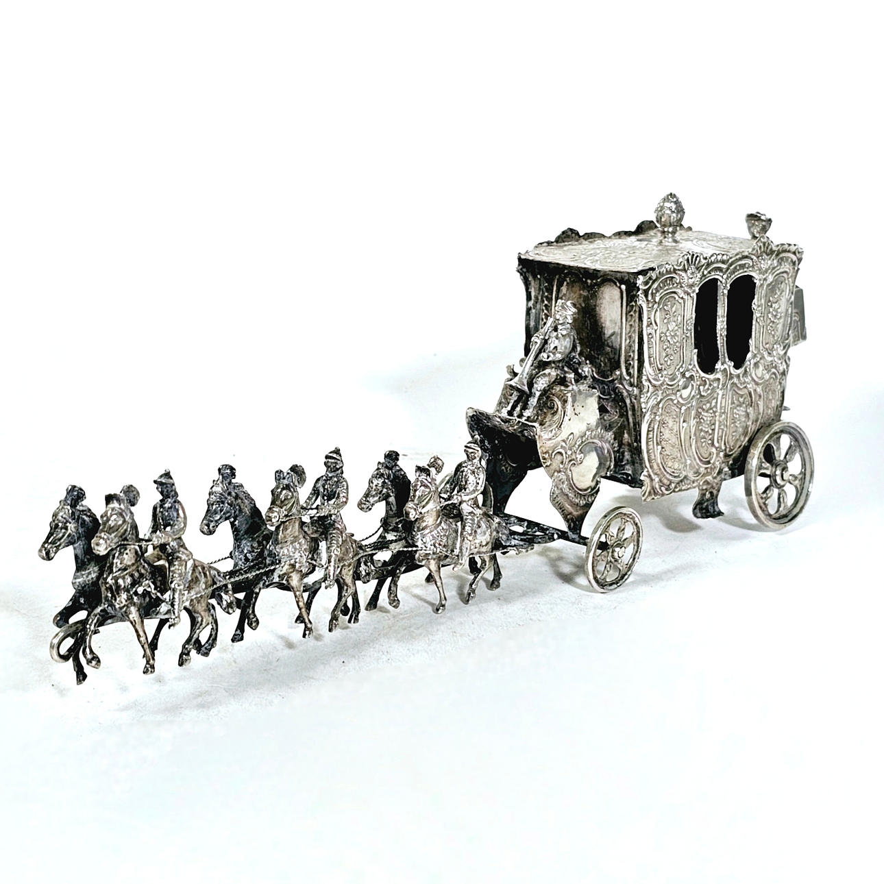 SILVER CARRIAGE WITH HORSES.